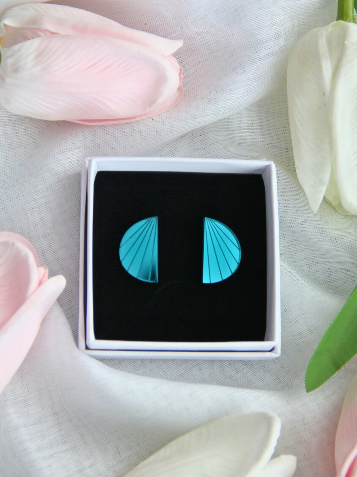 Lumo-nappikorvakorut