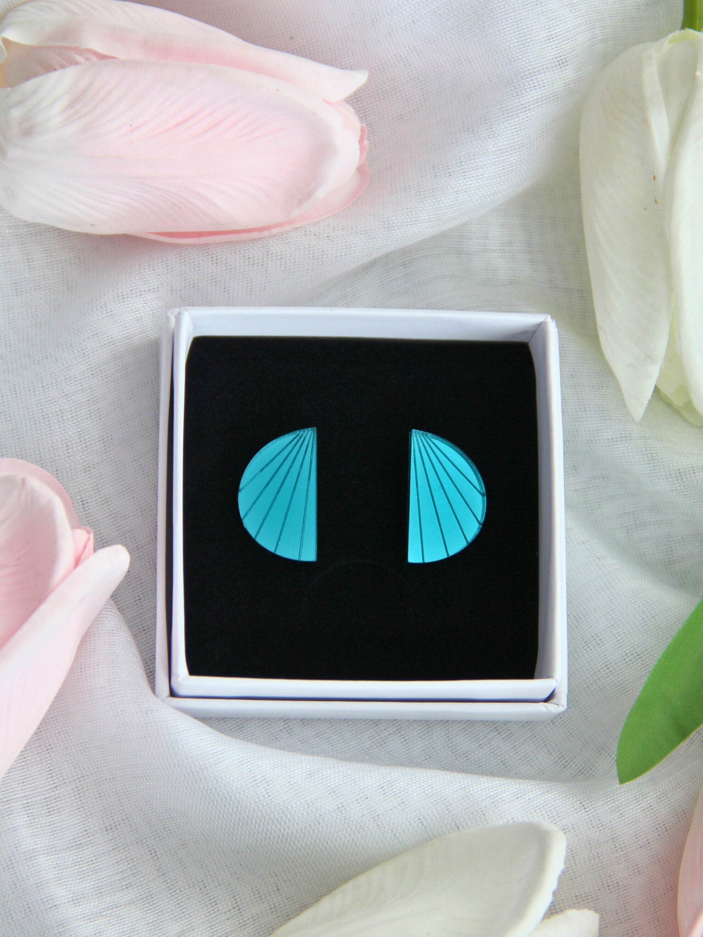 Lumo-nappikorvakorut