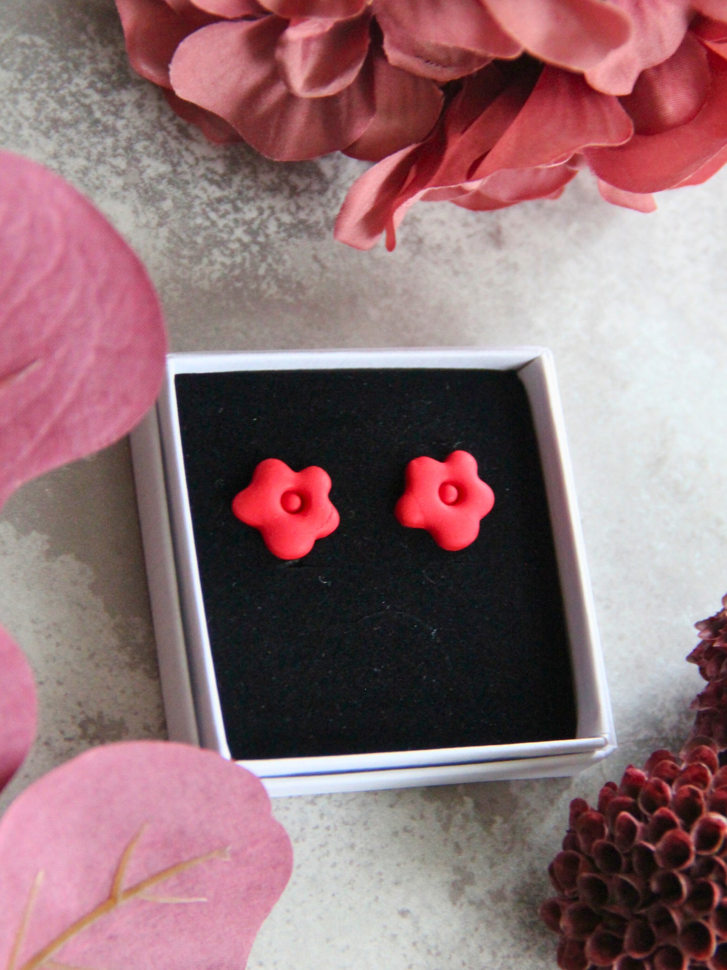 Blossom -nappikorvakorut