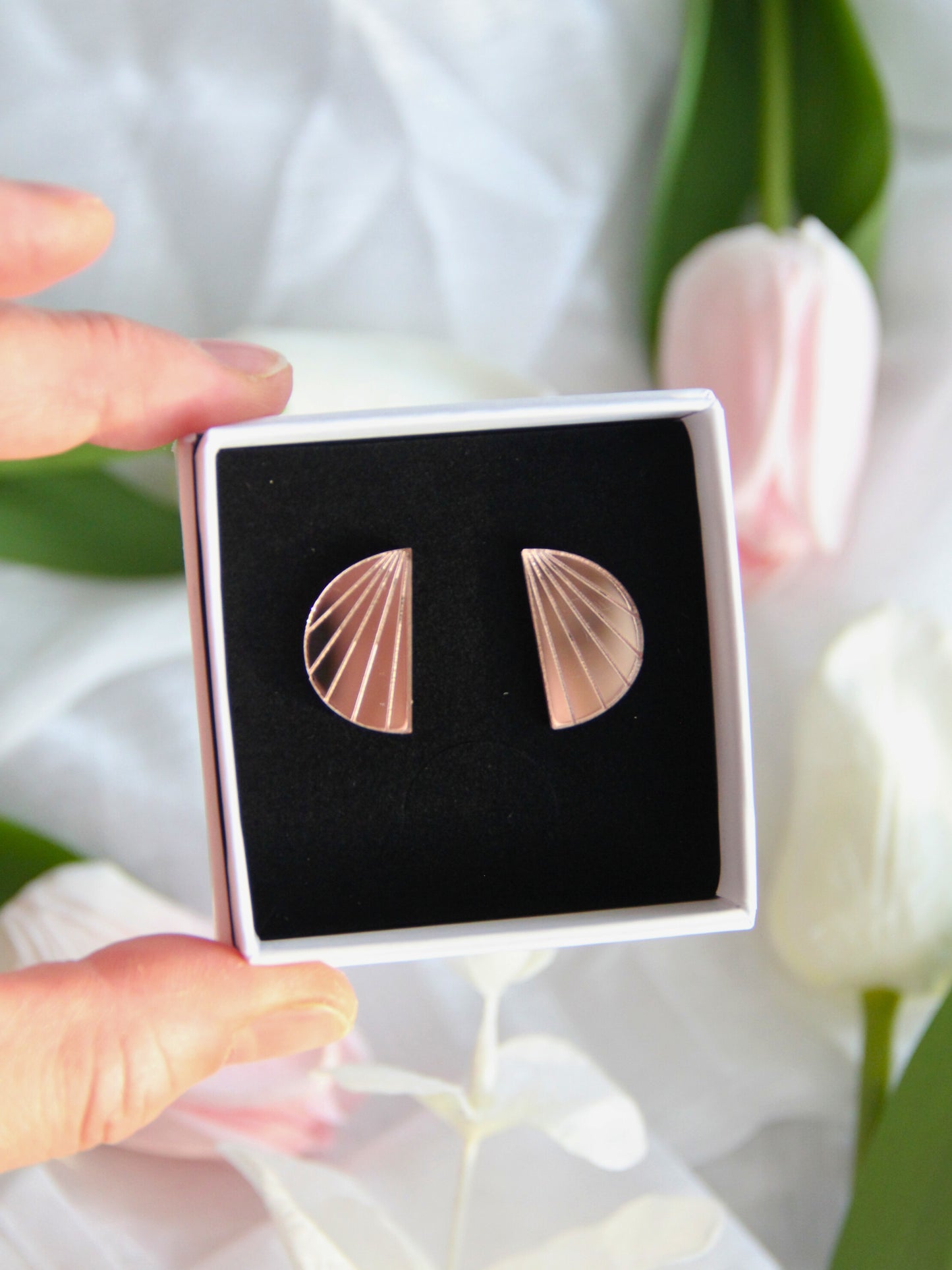 Lumo-nappikorvakorut