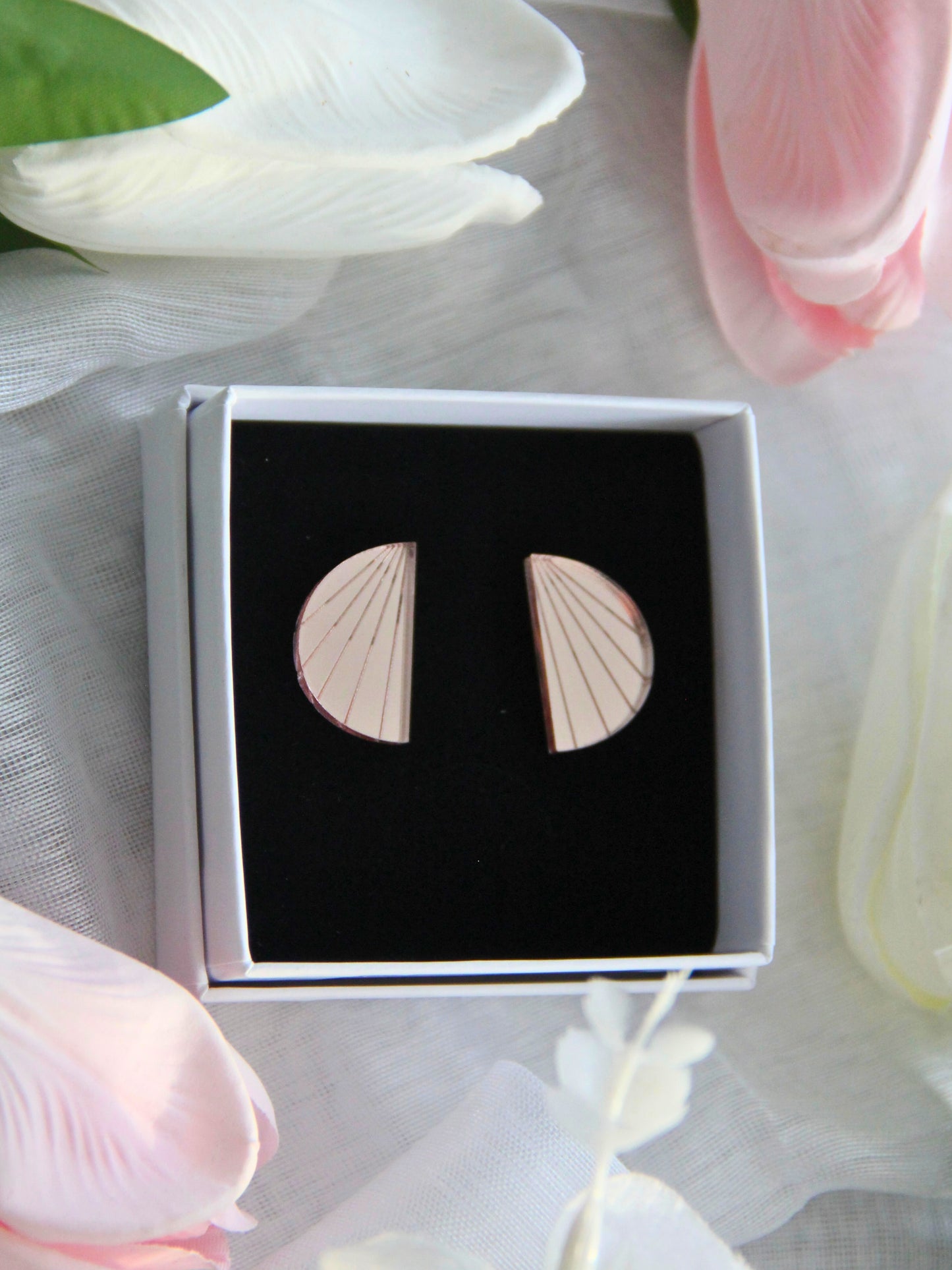 Lumo-nappikorvakorut