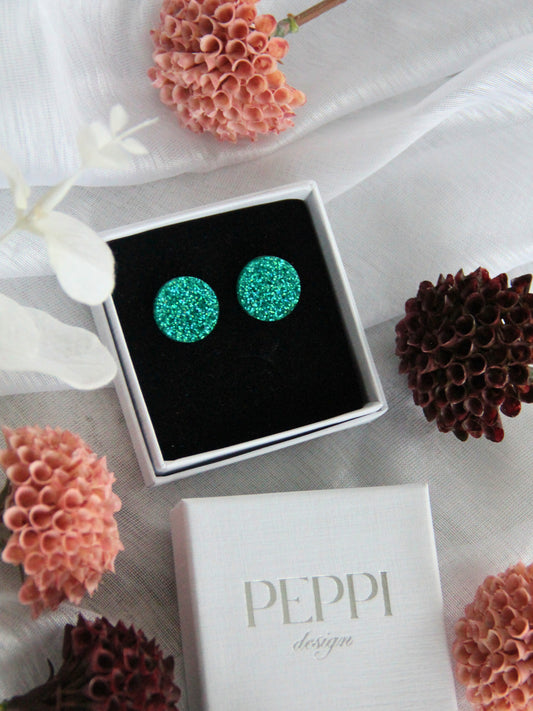 Turkoosi glitter -nappikorvakorut